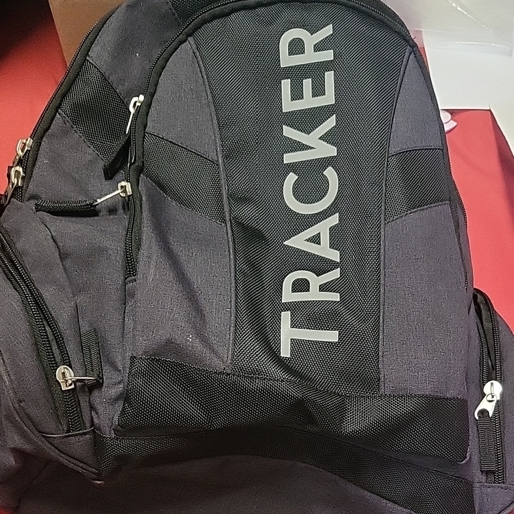 Black Backpack with Durable Material and Multiple Compartments